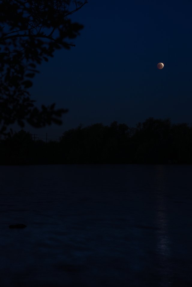 Almost total lunar eclipse as seen from England, captured on 2026-08-28, combined from 3 bracketed exposures into one HDR image. See post: https://instant.paperboat.website/blog/another-eclipse/